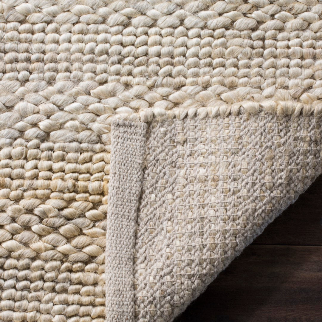 Exquisite Natural Hand-Woven Coastal Area Rug - Luxuriously Soft and Sustainable Jute for Beach House Allure and Urban Sophistication