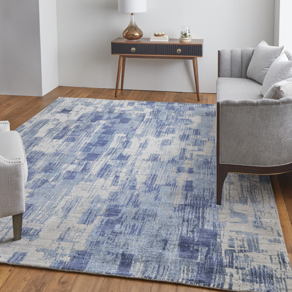 Unique Hand-Woven Ivory and Blue Abstract Area Rug for Stylish Warmth in Any Room