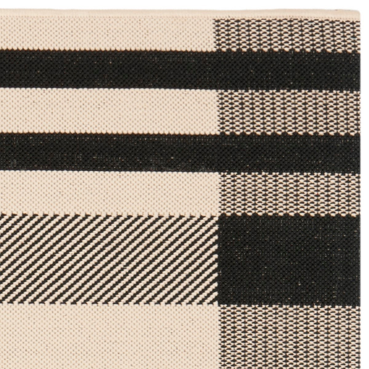 21-Inch Weatherproof Black and Bone Plaid Indoor/Outdoor Rug for Enchanting Patio Decor