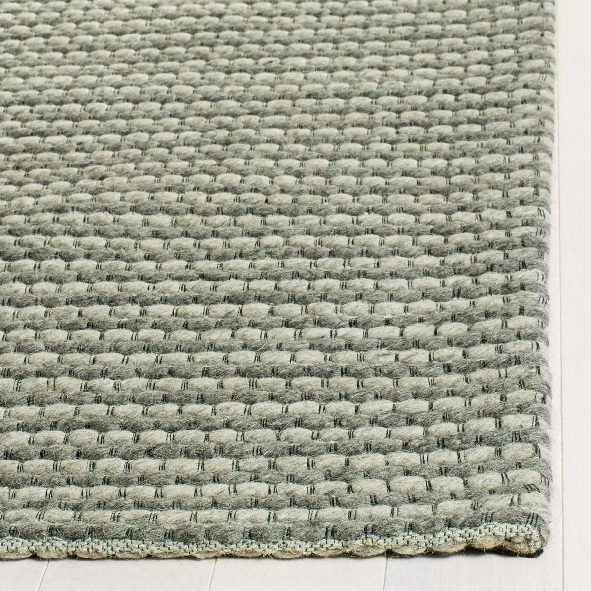Artisan-Made Natura Hand Woven Soft Wool Rug with Distinct Texture for Coastal Elegance