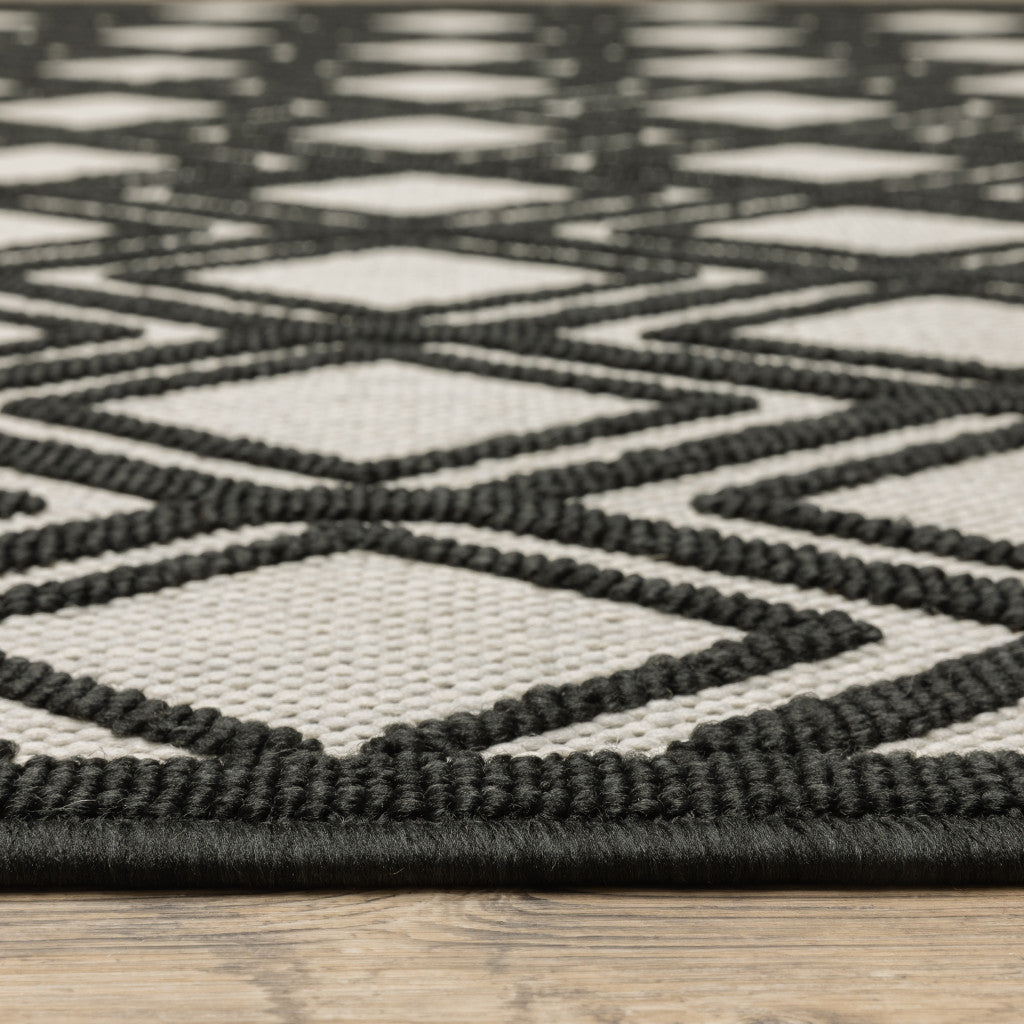 Stylish and Functional Indoor/Outdoor Area Rug - Beige and Black Geometric Design, Stain Resistant for Outdoor and Indoor Spaces