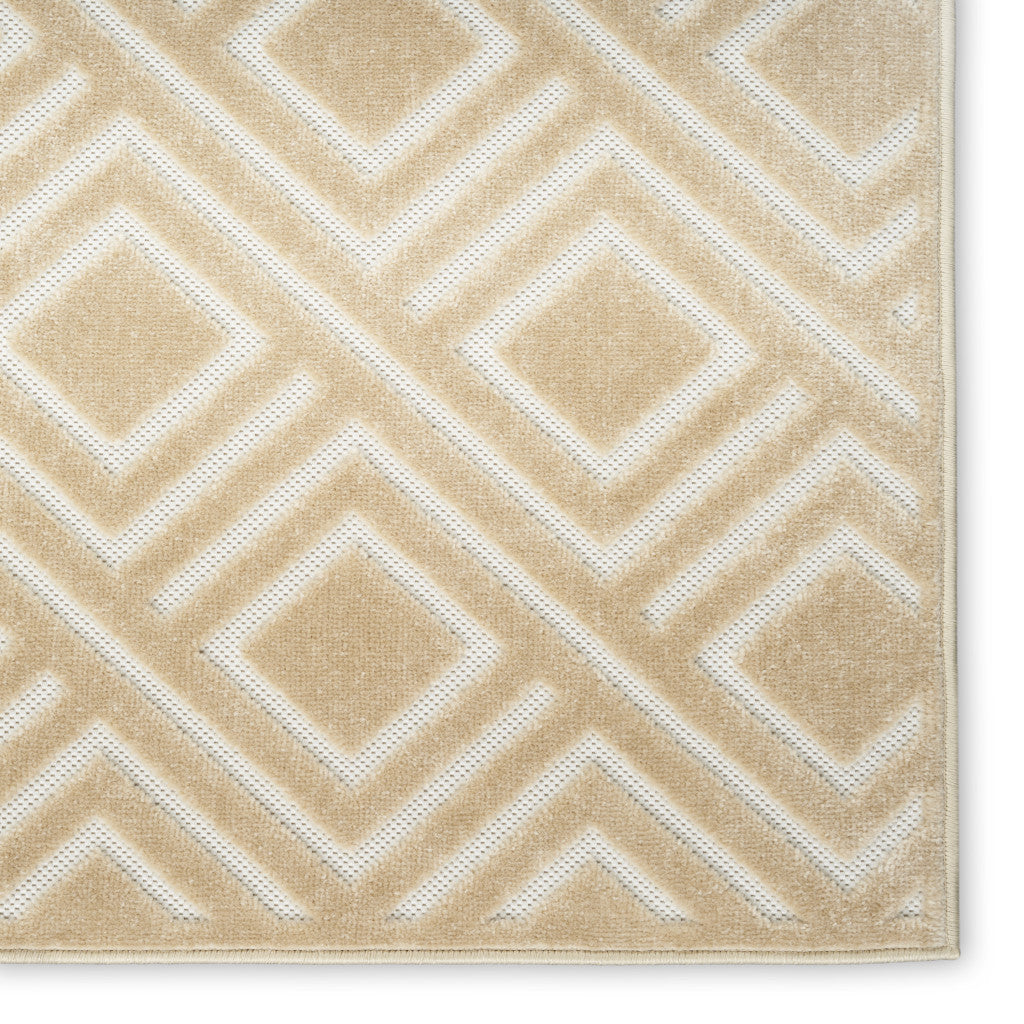 7' x 9' Tan Geometric Polypropylene Area Rug - A Stylish and Neutral Decorative Element to Add Warmth to Your Home Interior