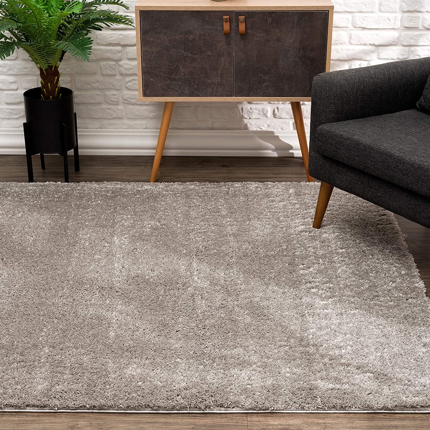 Ivory-Colored Modern Solid Shag Style Area Rug Crafted from Luxurious and Soft Polyester for Enduring Style and Unmatched Comfort