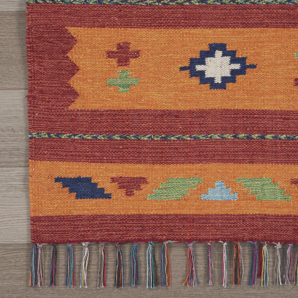 Exquisite Handmade Southwestern Style 7-Foot by 10-Foot Area Rug in Vivid Orange and Red with Fashionable Fringe Accents