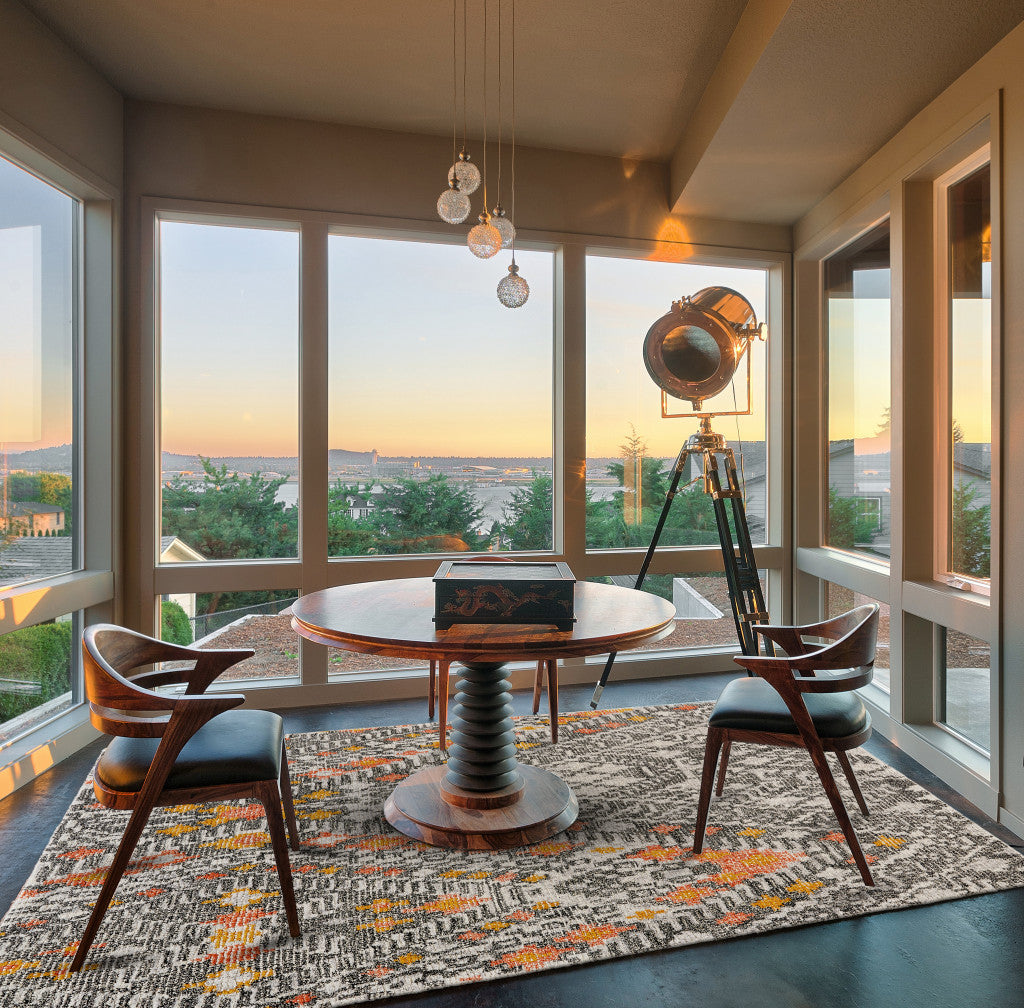 Stylish Handmade Geometric Round Area Rug in Gray, Ivory, and Orange Tones for Modern Living Spaces