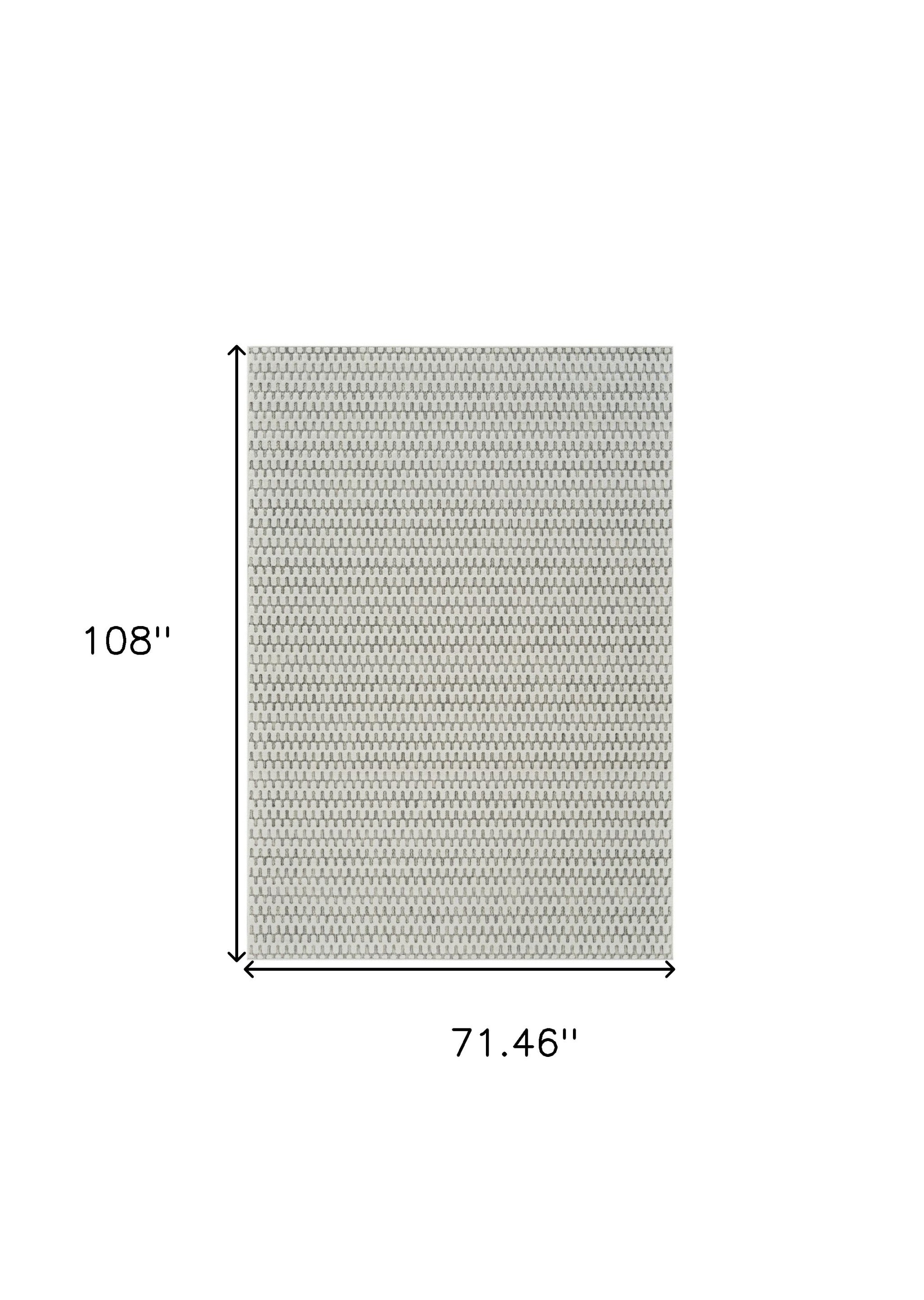 6' x 9' Cream and Beige Geometric Distressed Area Rug for Indoor/Outdoor Use