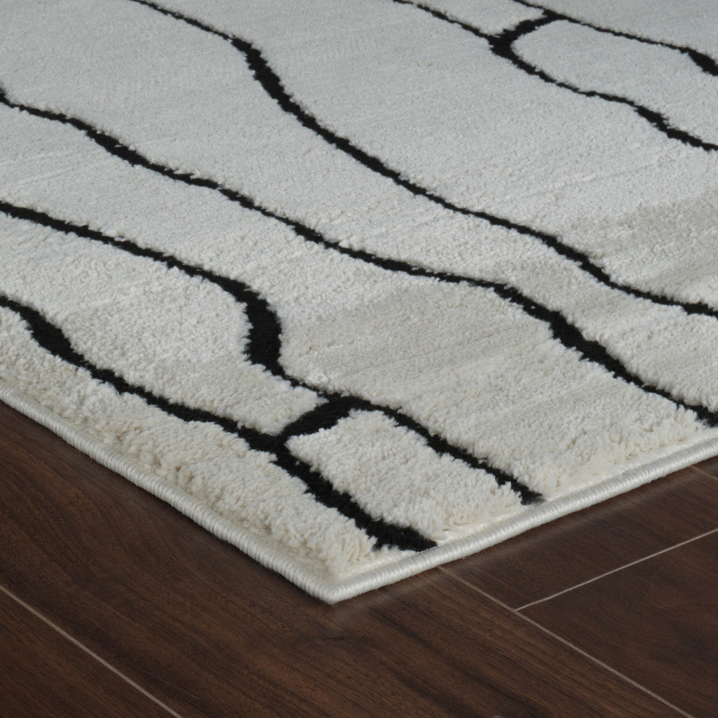 Stylish and Stain-Resistant Cream & Black Abstract Distressed Area Rug for Any Room - Ideal Floor Decor