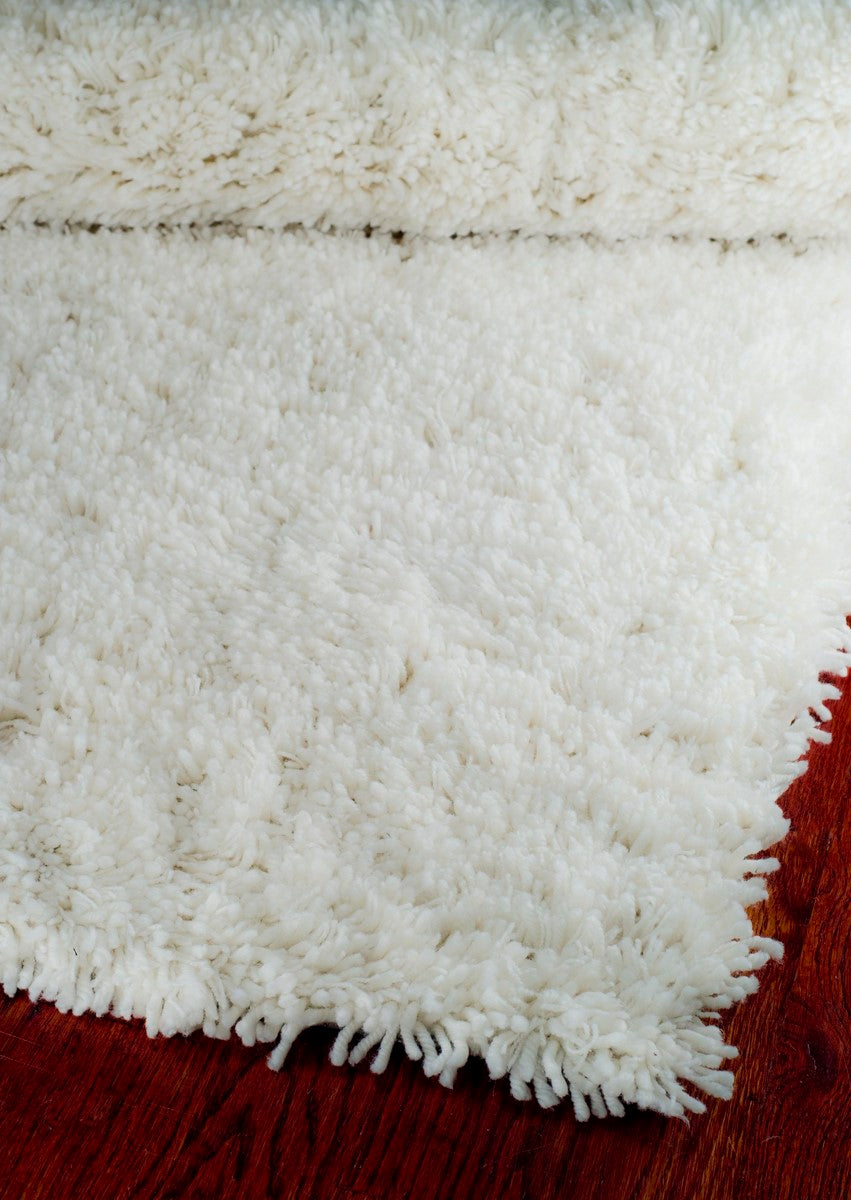Ivory Hand - Tufted Shag Area Rug: Soft Texture for Modern Metro - Chic Homes