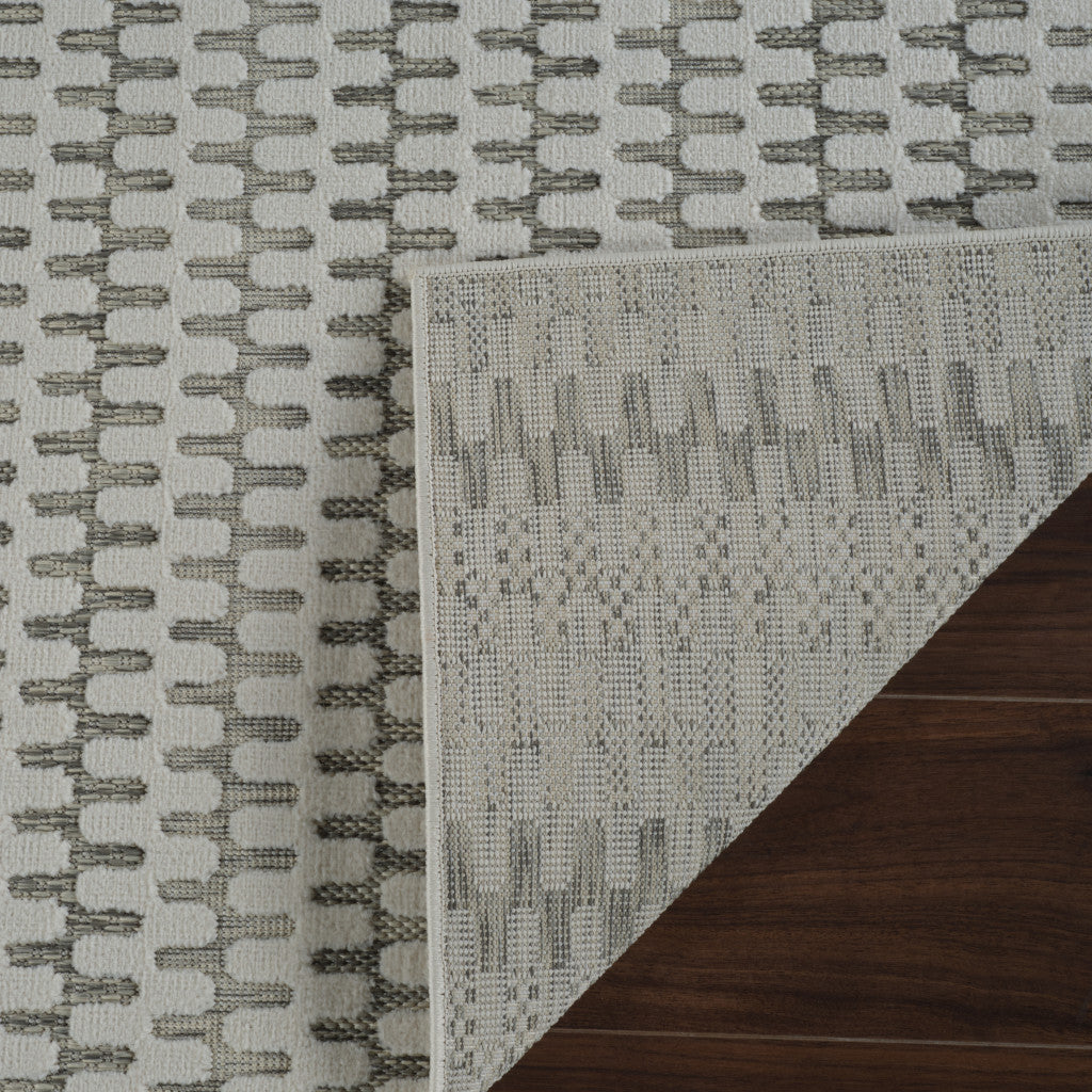 Stylish 4' x 6' Indoor/Outdoor Cream and Beige Geometric Stain-Resistant Area Rug