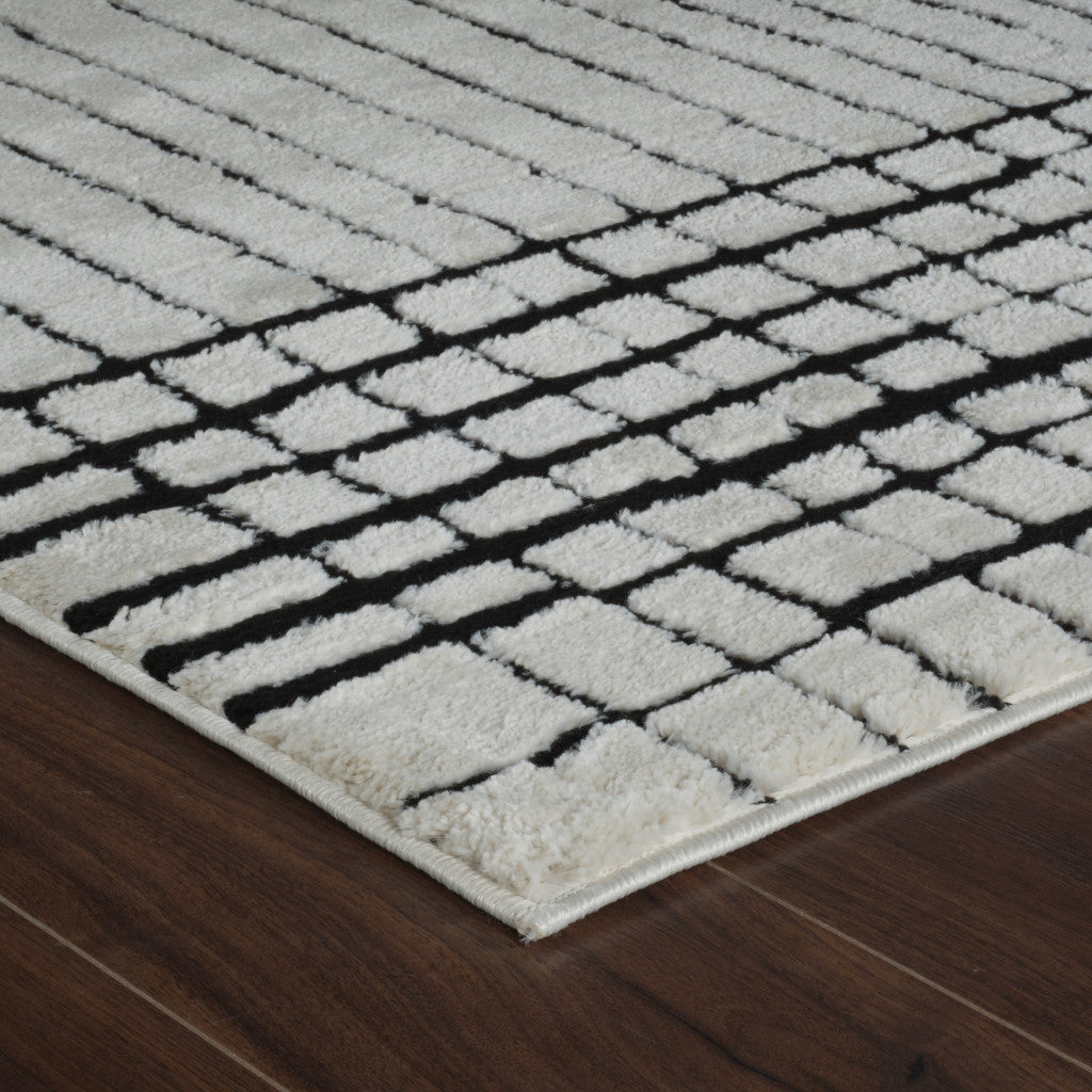 Stain-Resistant 5' x 8' Cream and Black Abstract Distressed Area Rug for Home Decor