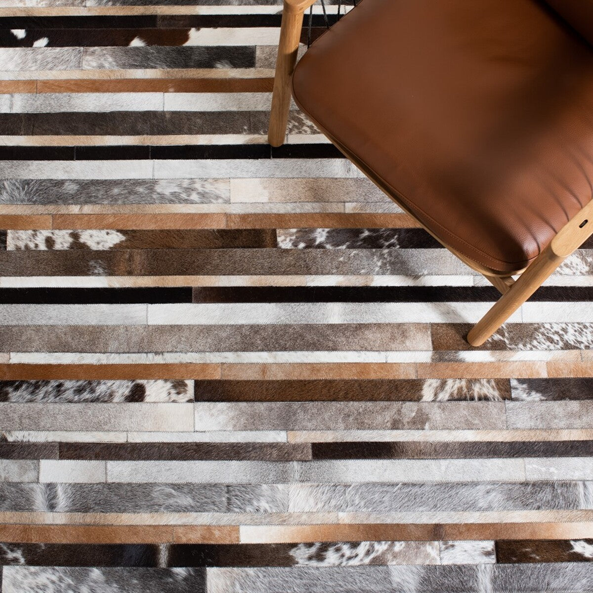 Exquisite Hand-Woven Indian Leather Rug: Studio Leather 215 for Timeless Style