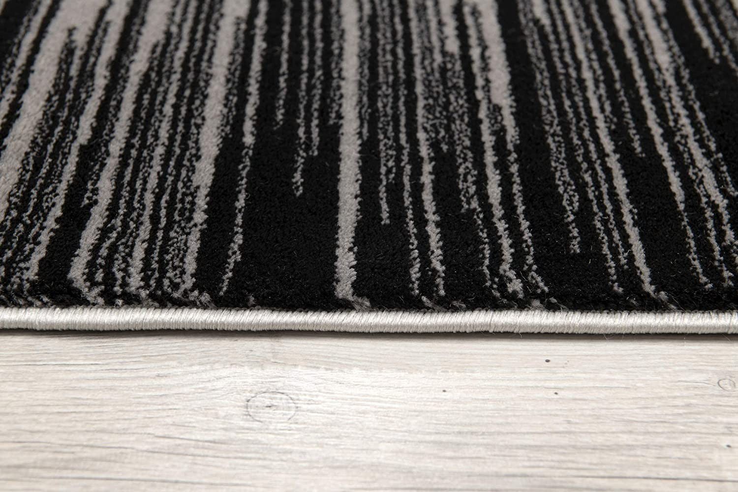 Stylish and Luxurious Black Transitional Striped Runner Rug for Modern Interior Spaces - A Durable Decorative Piece