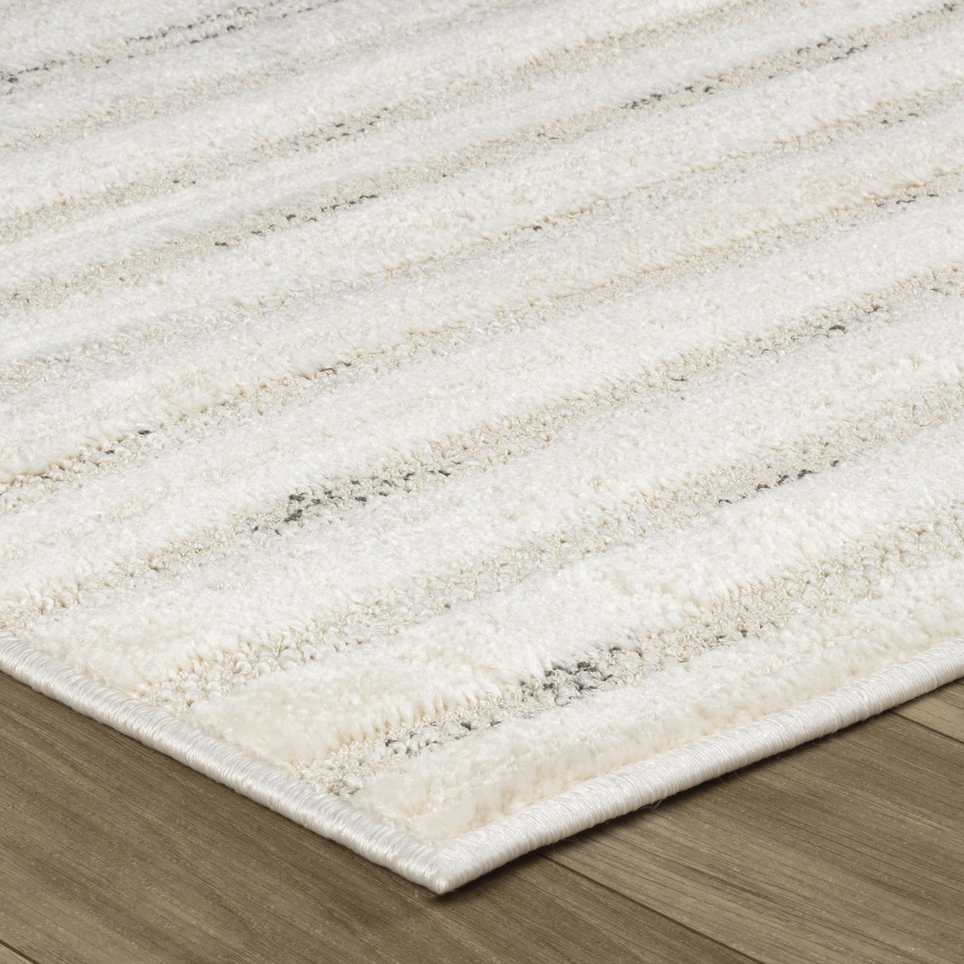 Soft and Stain-Resistant Cream & Beige Abstract Polyester Area Rug for Family-Friendly Living Spaces