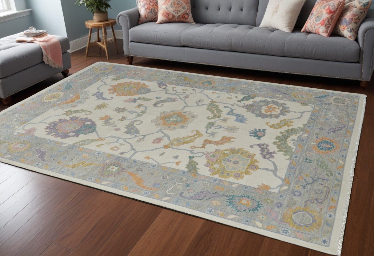 Exquisite Hand-Knotted Wool Floral Area Rug in Gray, Orange, and Ivory with Stain-Resistant Feature for a Cozy Home Ambiance