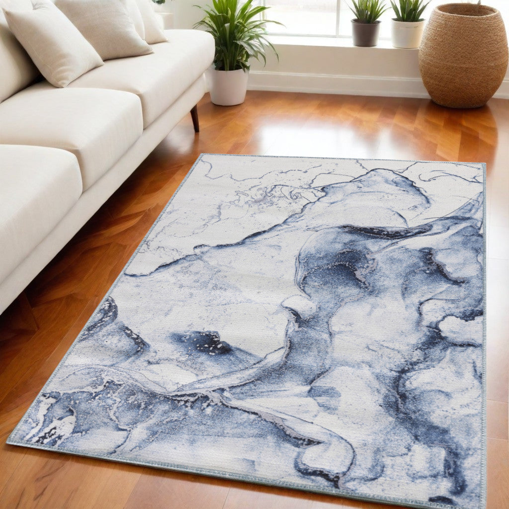 Stylish 5' x 7' Ivory & Blue Abstract Power Loom Area Rug for Modern Home Décor and Comfort