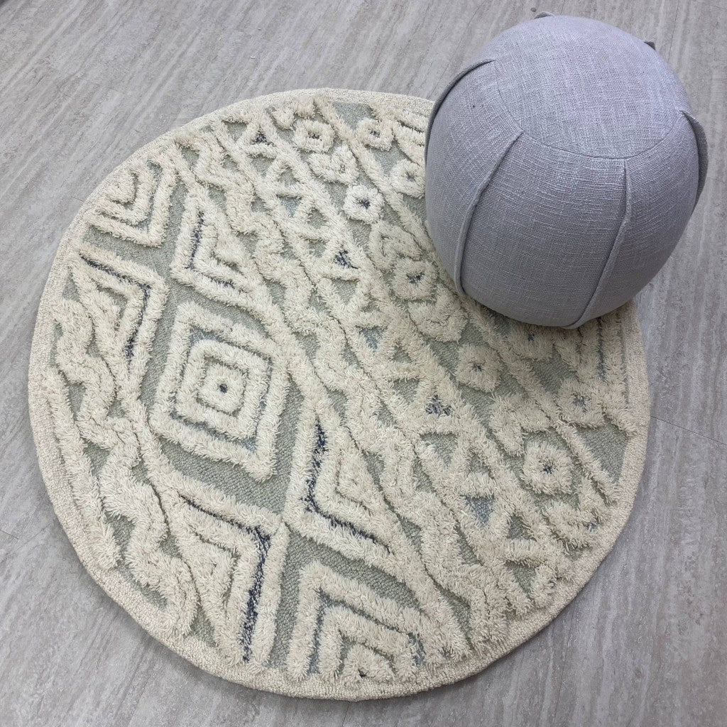 Handmade Wool Round Cream Geometric Area Rug for Cozy Bohemian Homes