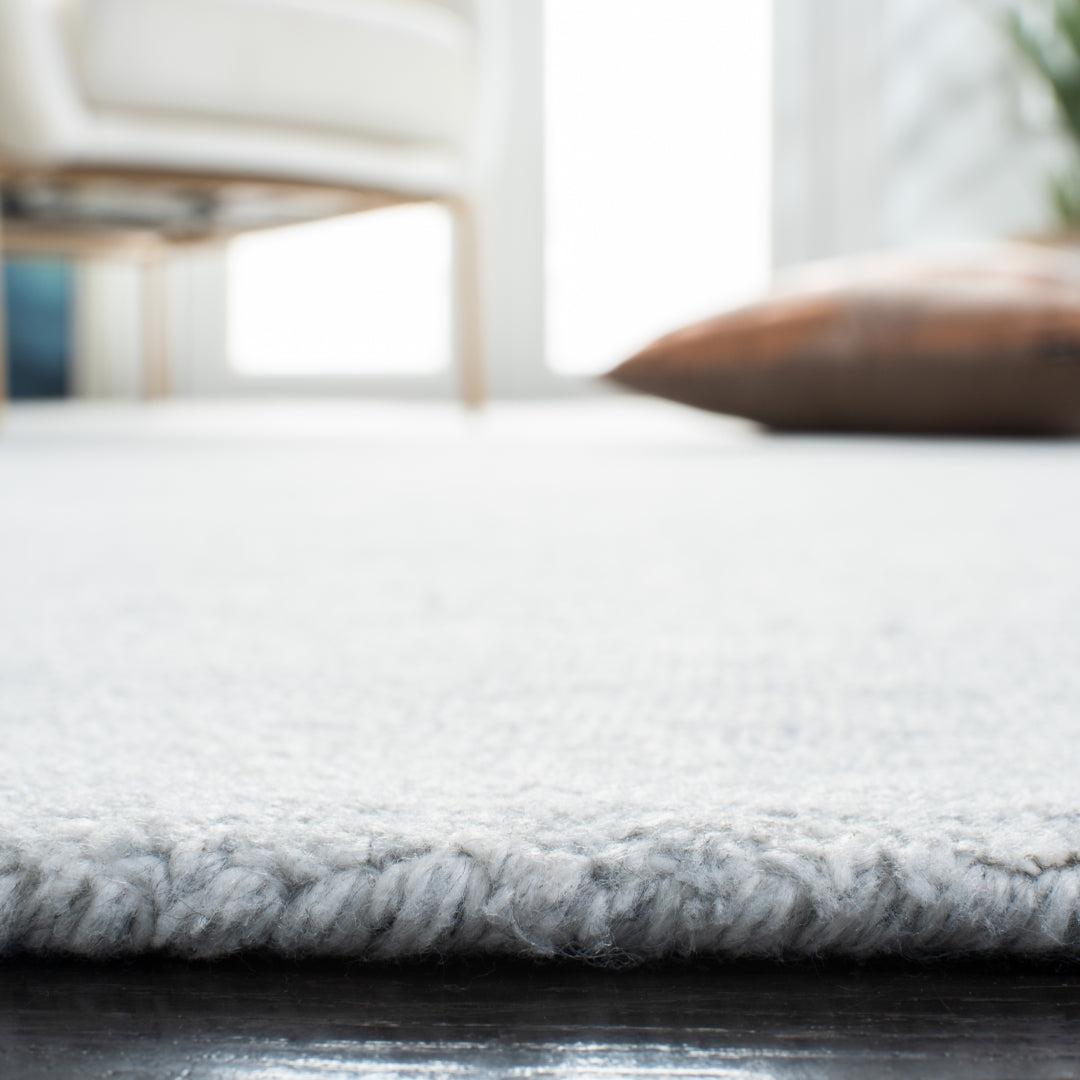 Luxurious Contemporary Hand - Loomed Rug: 90% Polyester Blend with Cotton Backing