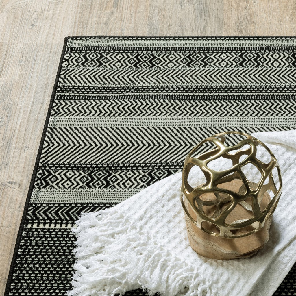Stylish and Durable Black and White Ornate Stripes Machine-Woven Polypropylene Runner Rug - A Stain-Resistant Interior Decor Essential