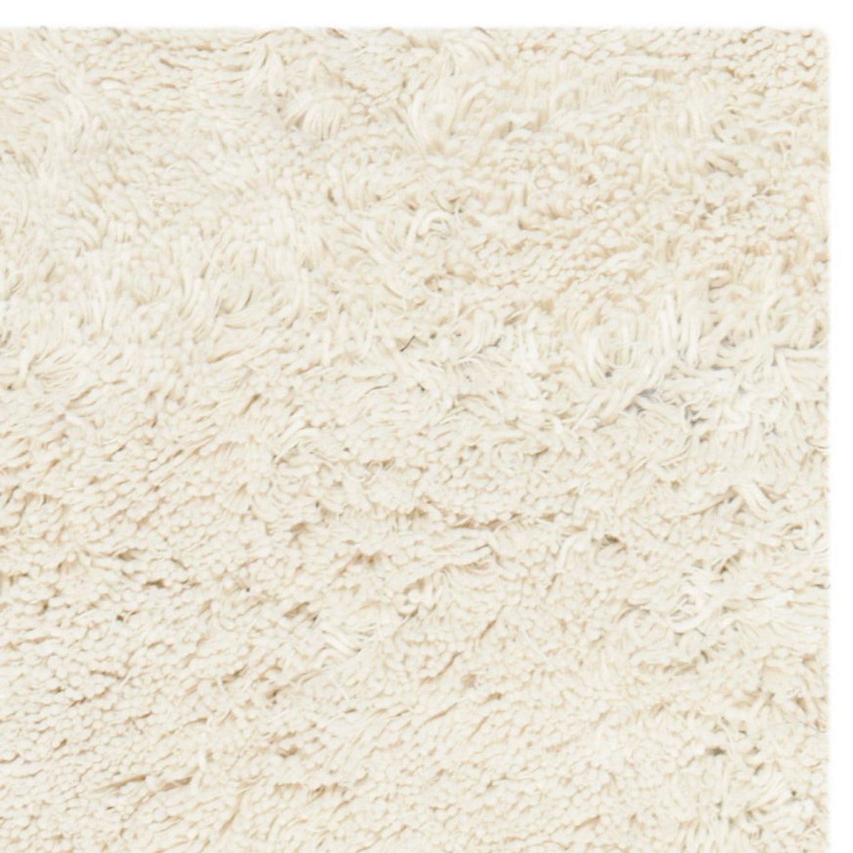 Ivory Hand - Tufted Shag Area Rug: Soft Texture for Modern Metro - Chic Homes