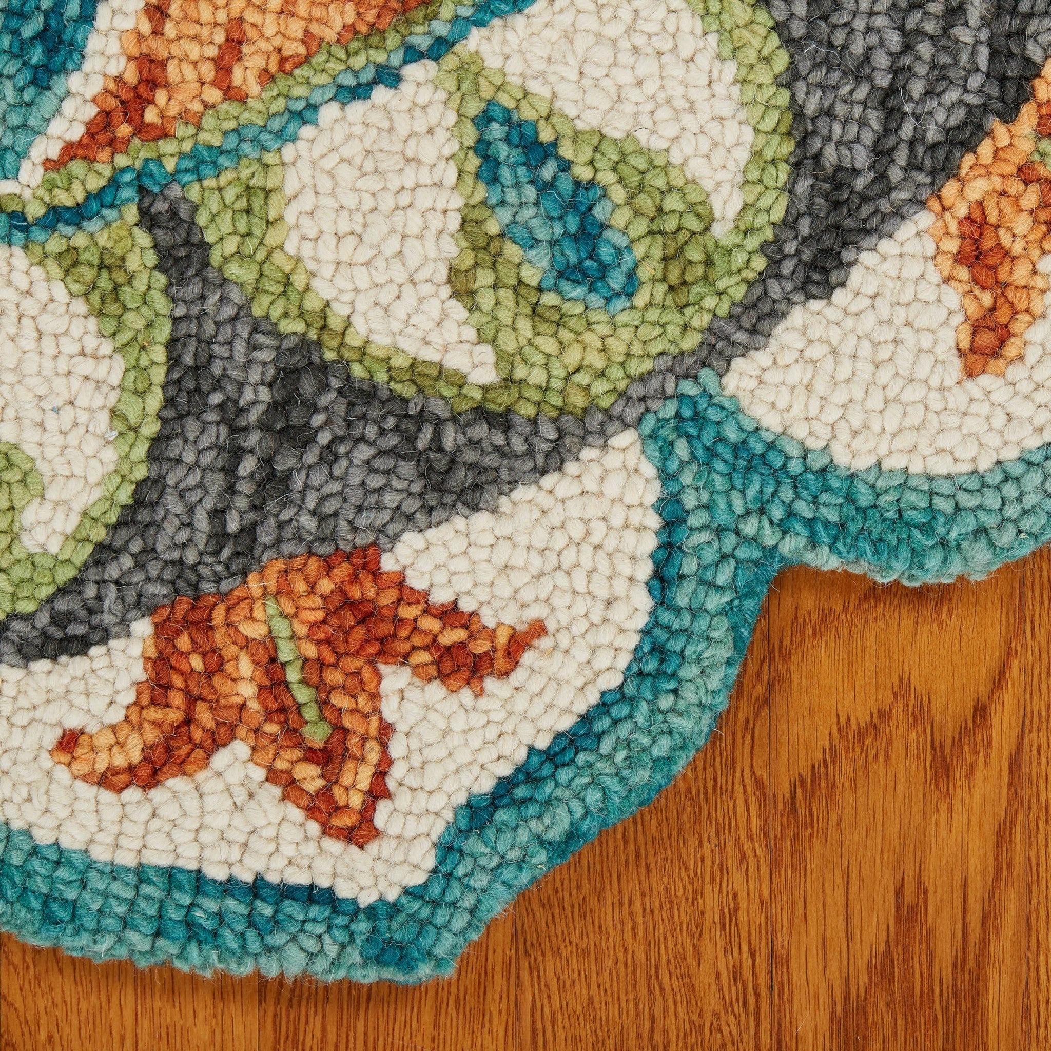 Handmade Round Area Rug in Blue, Orange & Green - Timeless Floral Elegance