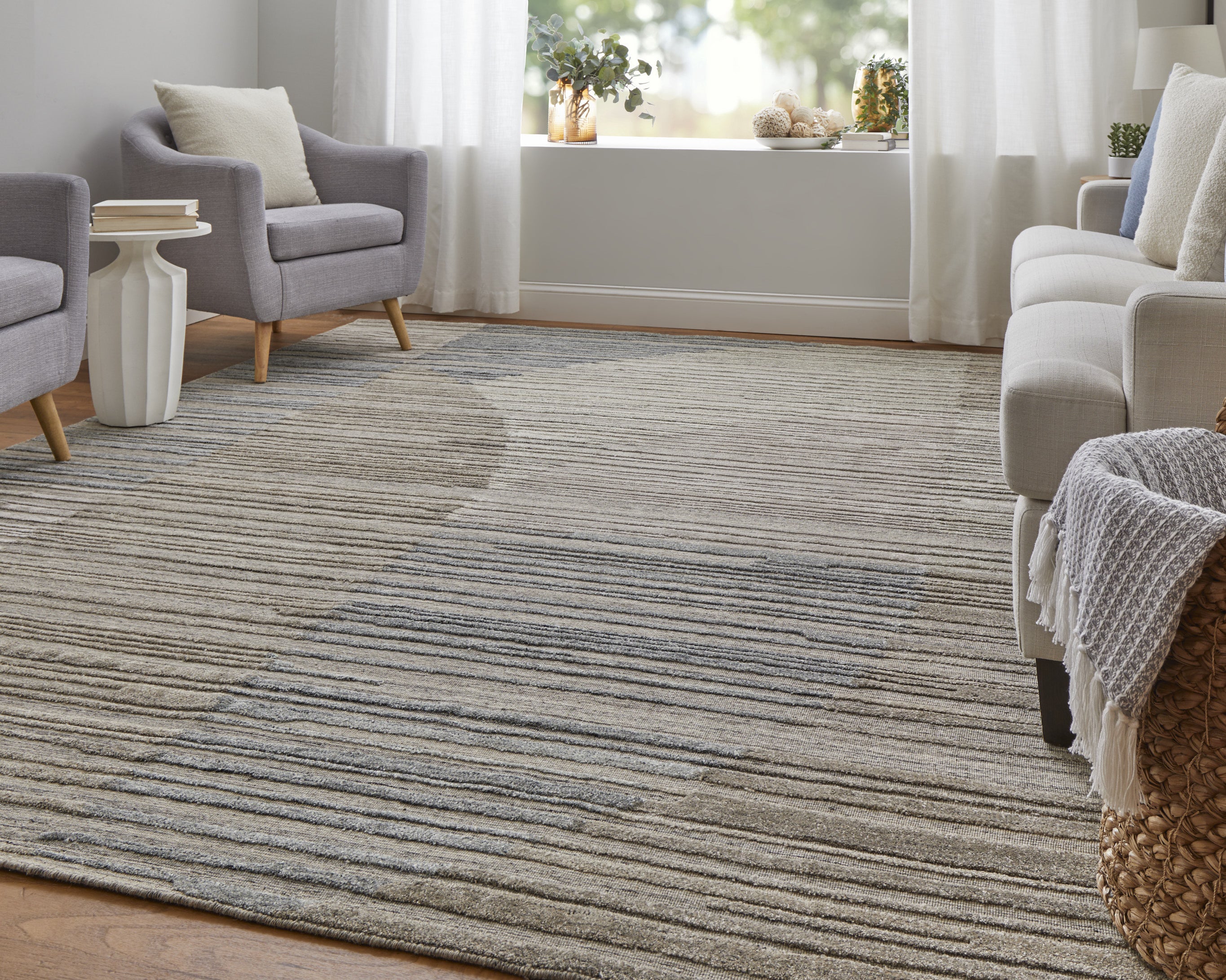 Exquisite Hand-Woven Abstract Tan and Blue Area Rug for a Stylishly Decorated Living Room