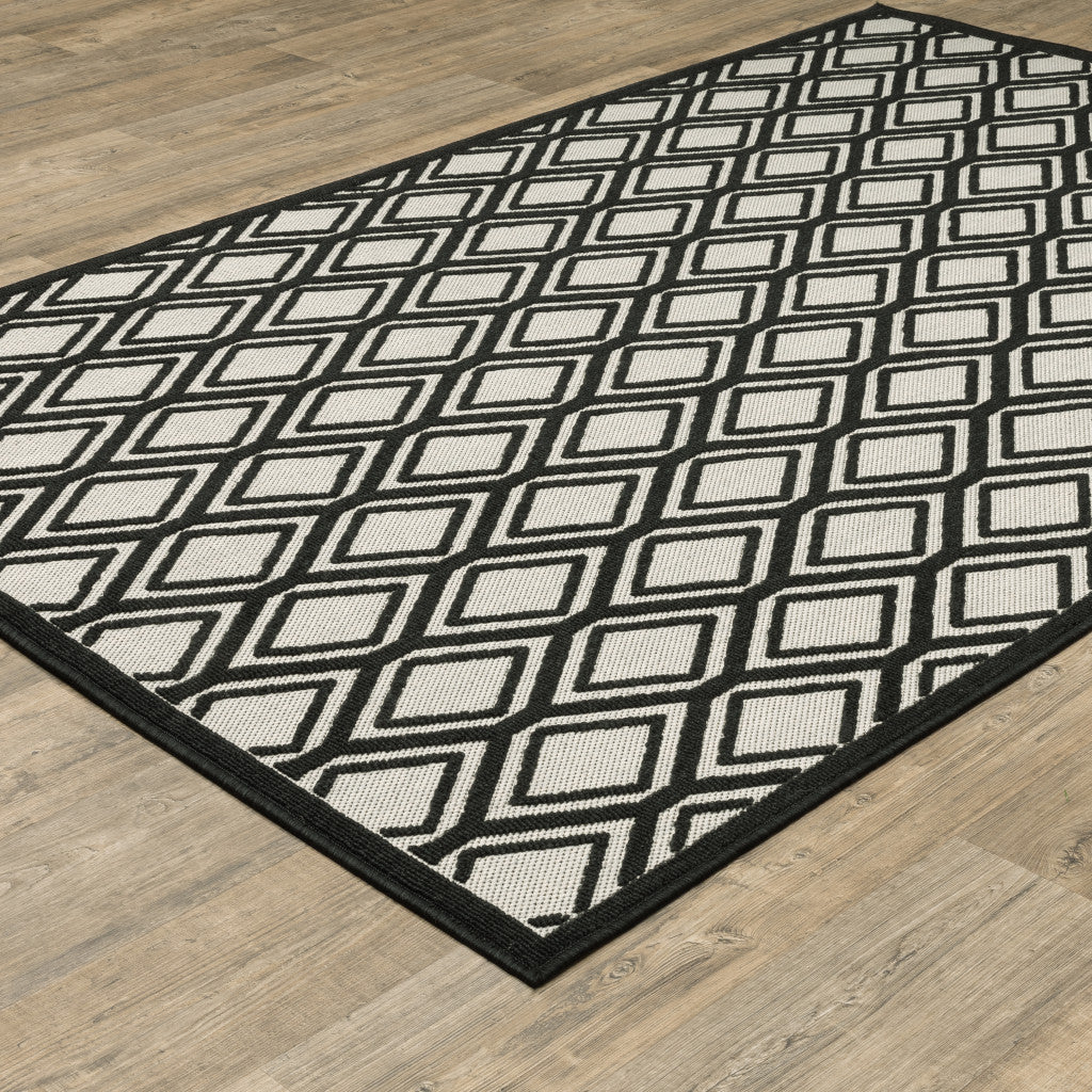 Stylish and Functional Indoor/Outdoor Area Rug - Beige and Black Geometric Design, Stain Resistant for Outdoor and Indoor Spaces
