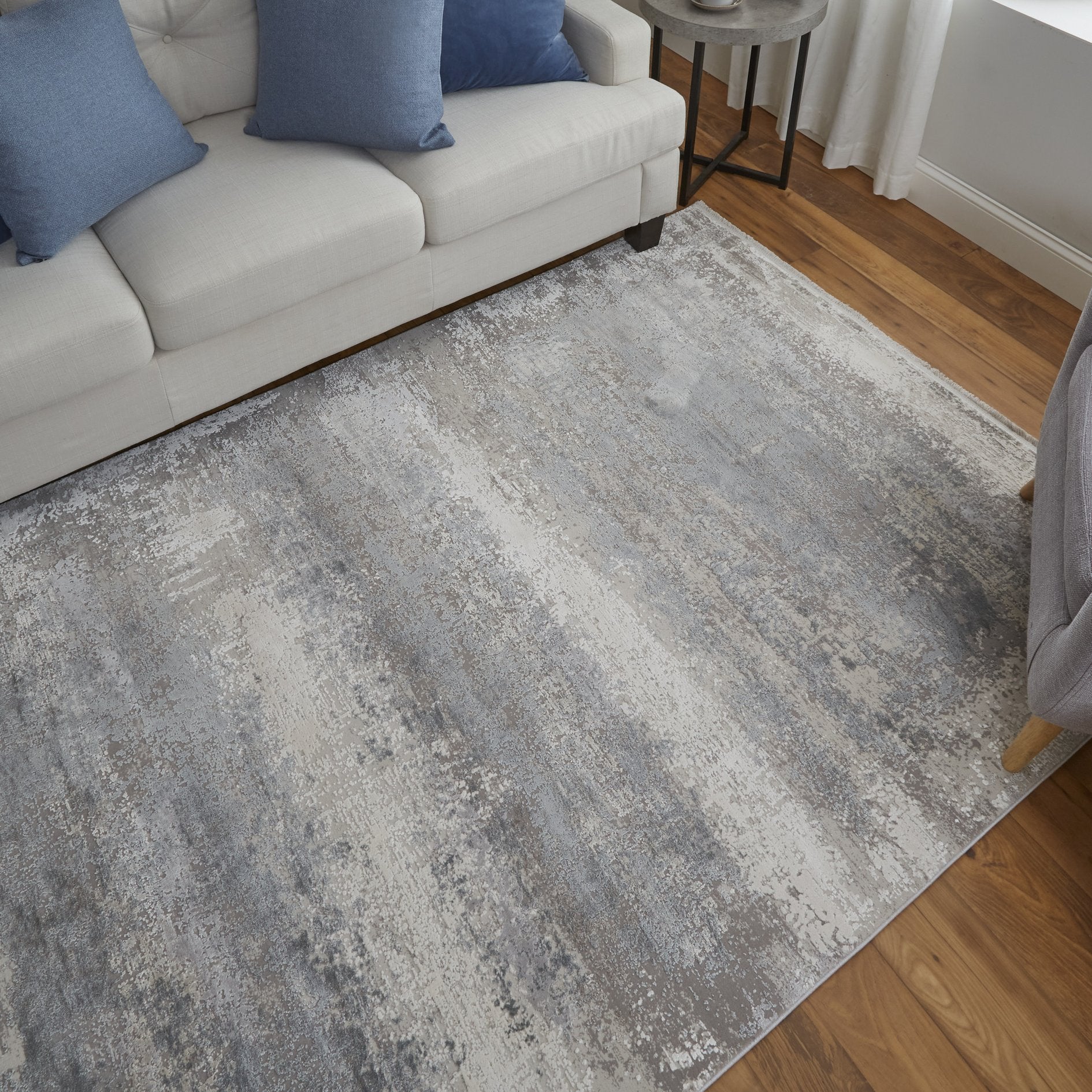 Luxurious Machine-Woven Cadiz Abstract Watercolor Area Rug with Spanish Elegance Inspirations