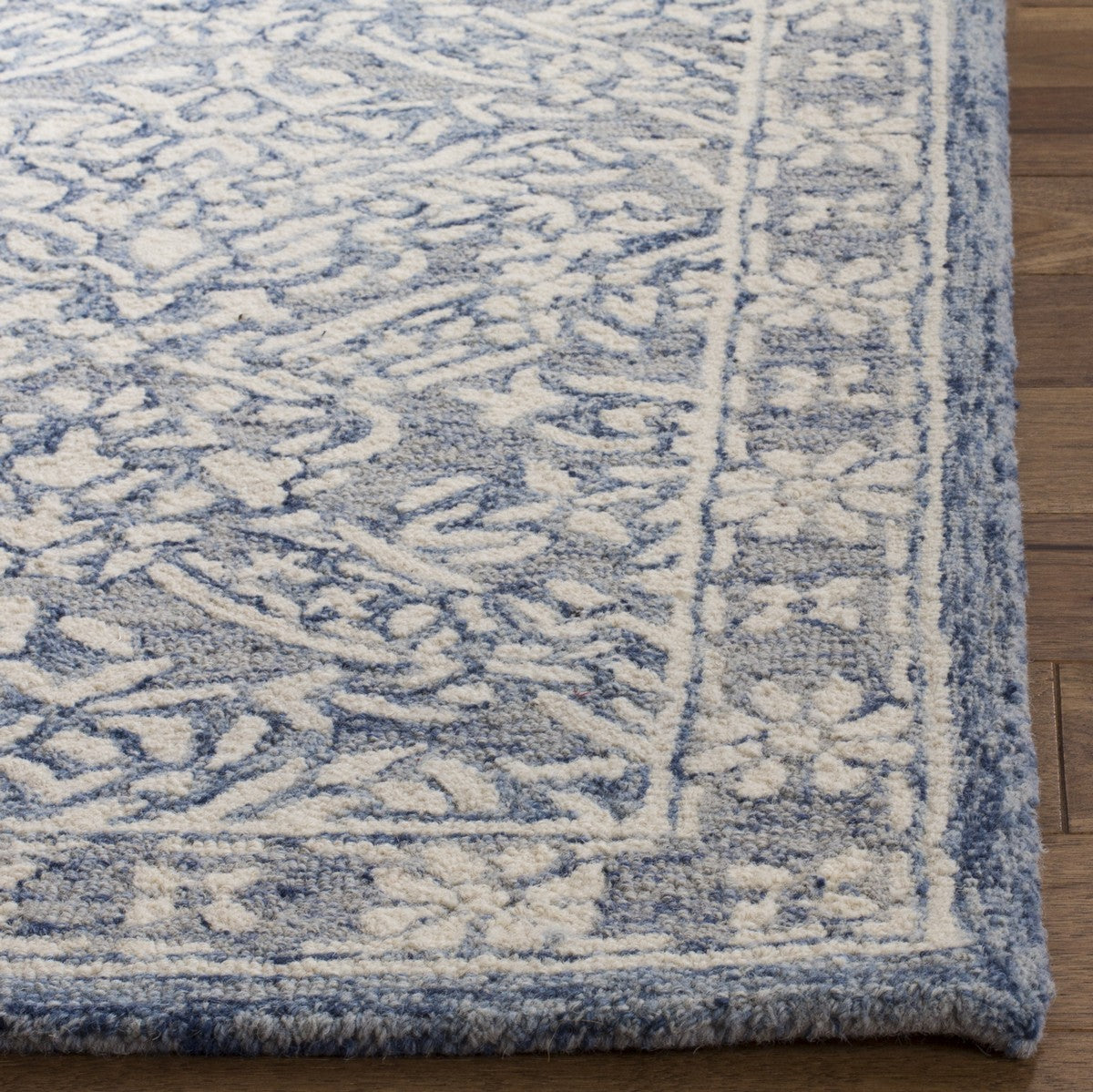 Luxurious Hand - Tufted Wool Miro - Loop Rug for Timeless Home Decor