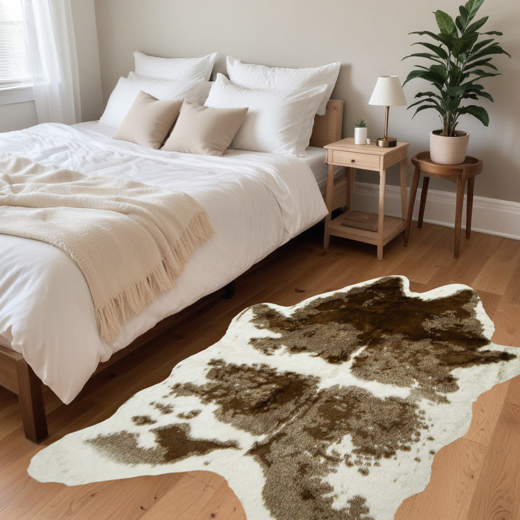Exquisite Handmade Cowhide Area Rug with Unique Animal Print for Home Elegance