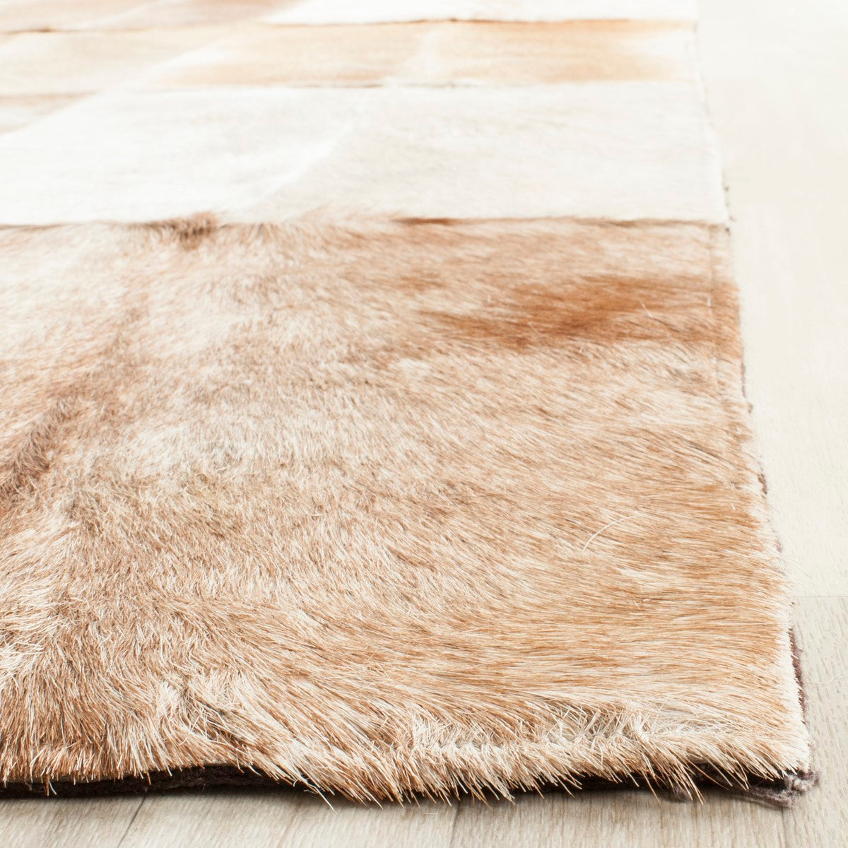 Studio Hand-Woven Fashionable and Textured Leather Rug - An Ideal Cowhide Carpet for Modern Rustic Interior Decor