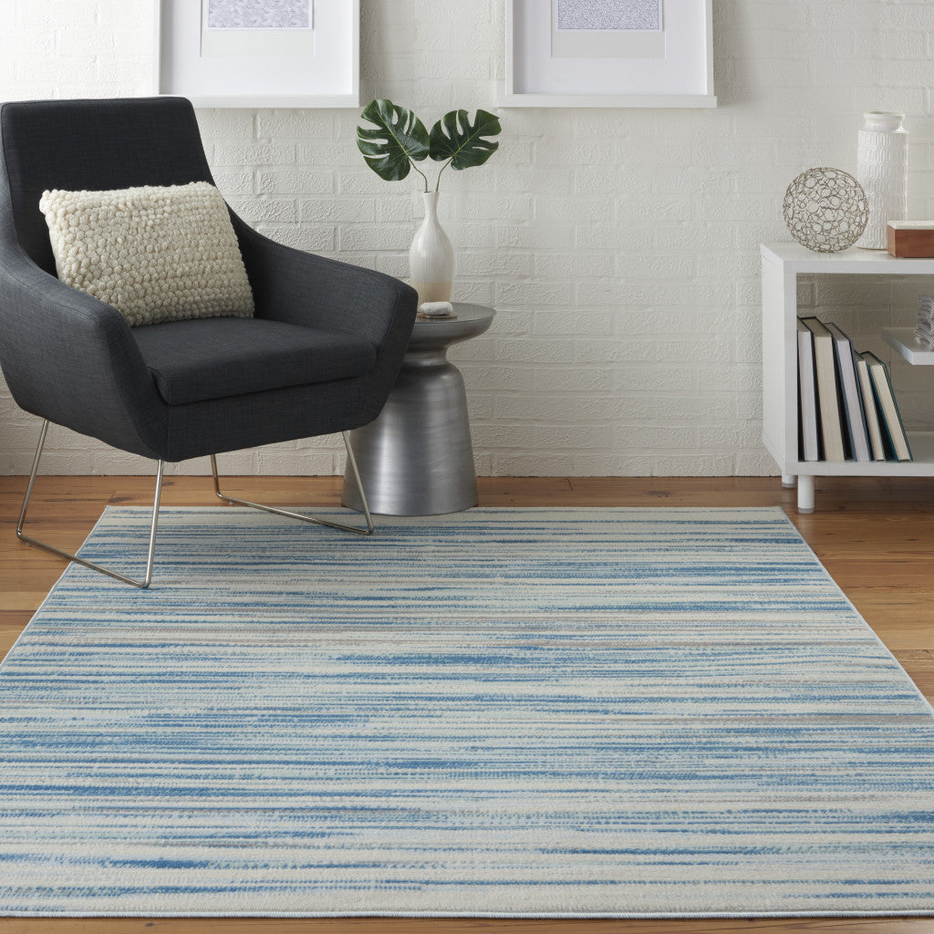 Durable & Stain-Resistant 5' x 7' Ivory, Blue & Gray Abstract Non-Slip Area Rug