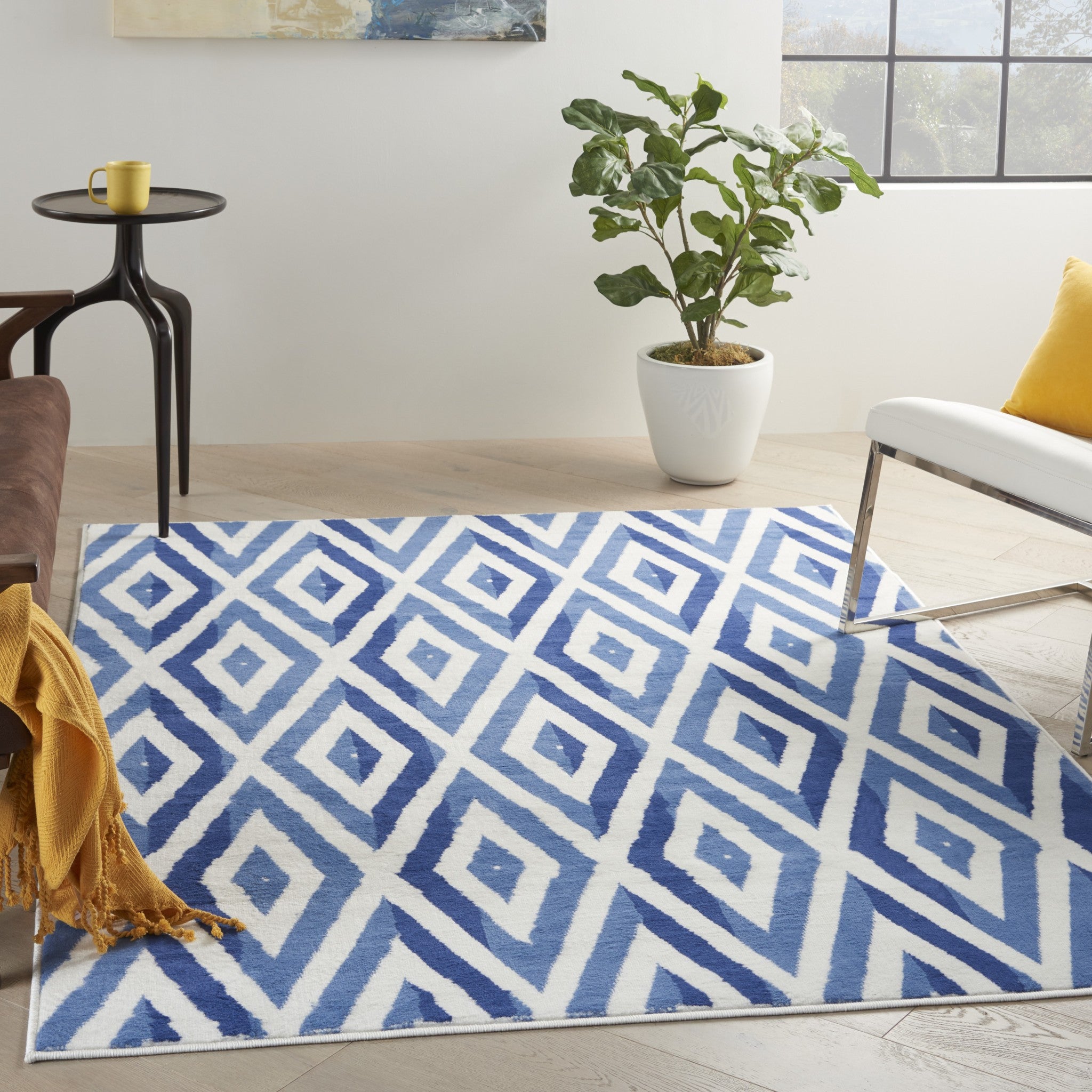 Stylish Geometric Blue and Ivory Polypropylene Dhurrie Area Rug Ideal for Adding Elegance and Warmth to Any Living Space