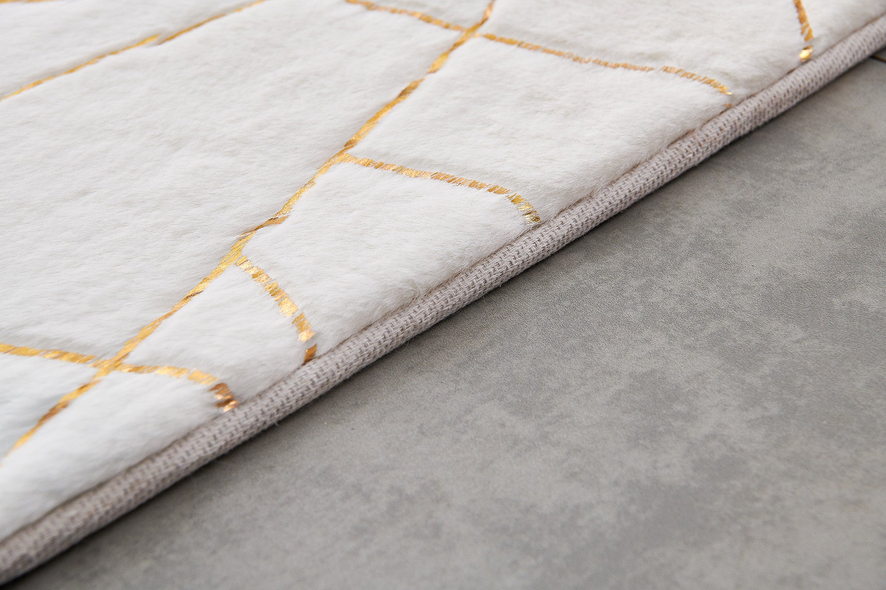 Washable & Non-Skid Faux Sheepskin Area Rug with Elegant White & Gold Abstract Design