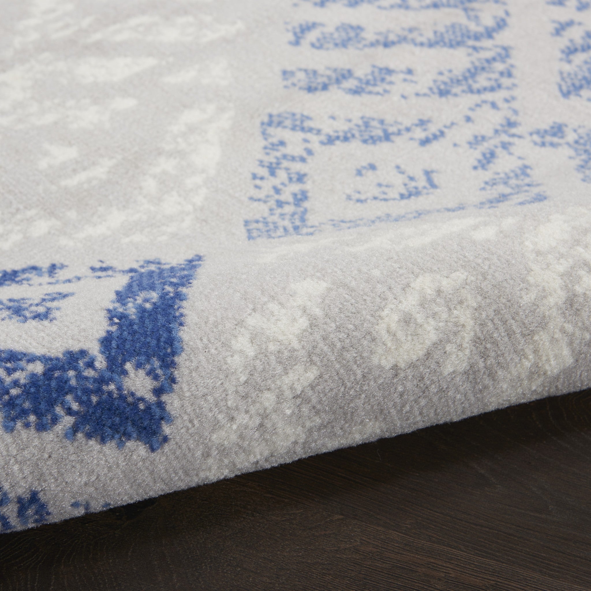 Stylish Geometric Blue and Ivory Polypropylene Dhurrie Area Rug Ideal for Adding Elegance and Warmth to Any Living Space