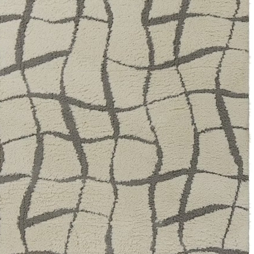 Elegant and Stylish Ivory Abstract Shag Area Rug for Cozy and Artistic Home Decor Enhancement