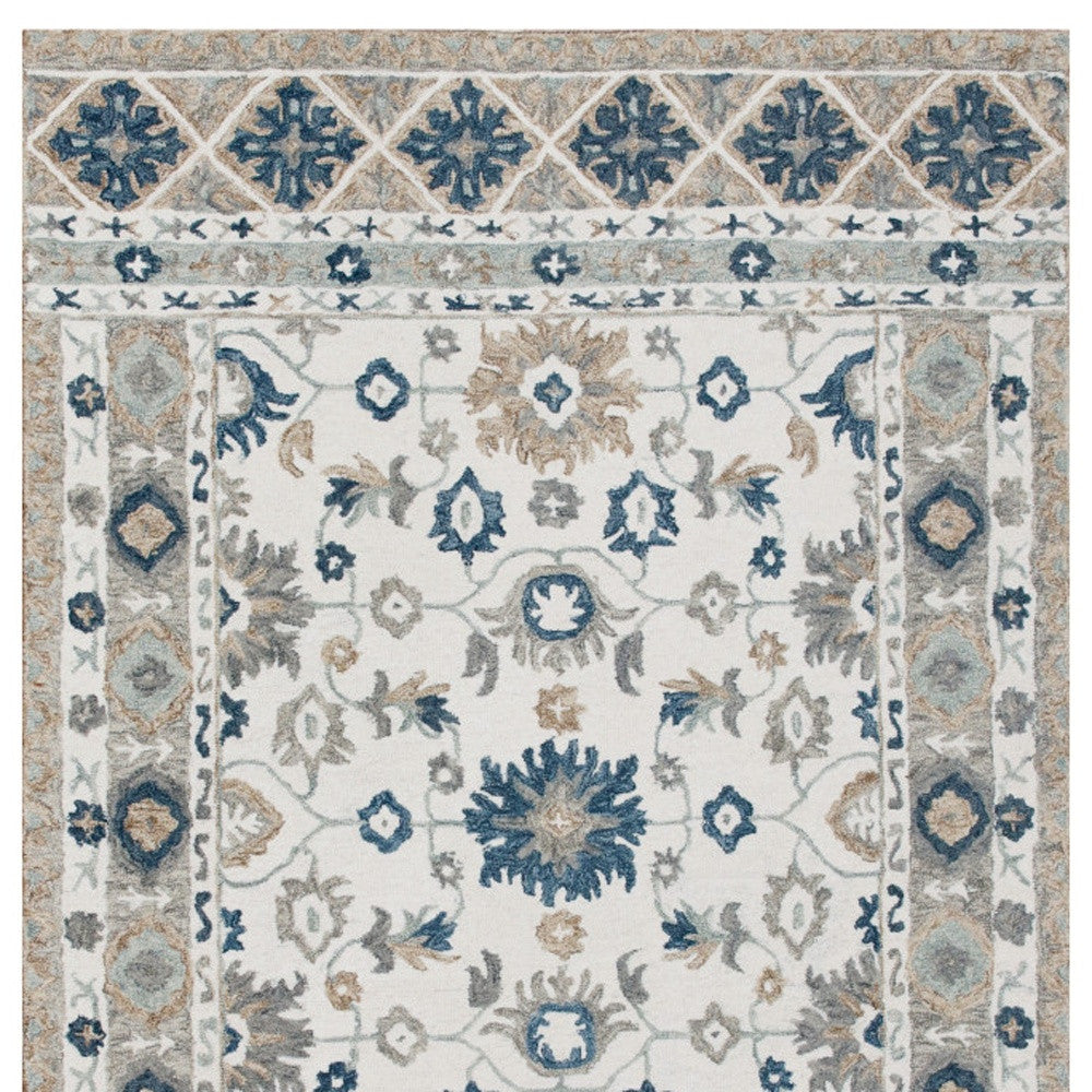 Exquisite Hand-Tufted Blue and Ivory Floral Area Rug for Your Space